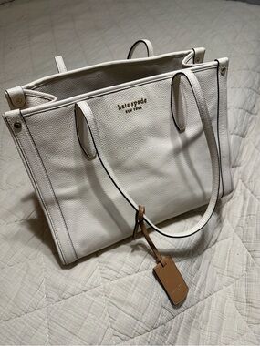 kate spade White Pebbled Leather Tote with Tan Luggage Tag